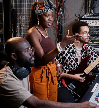a band making a music at the studio
