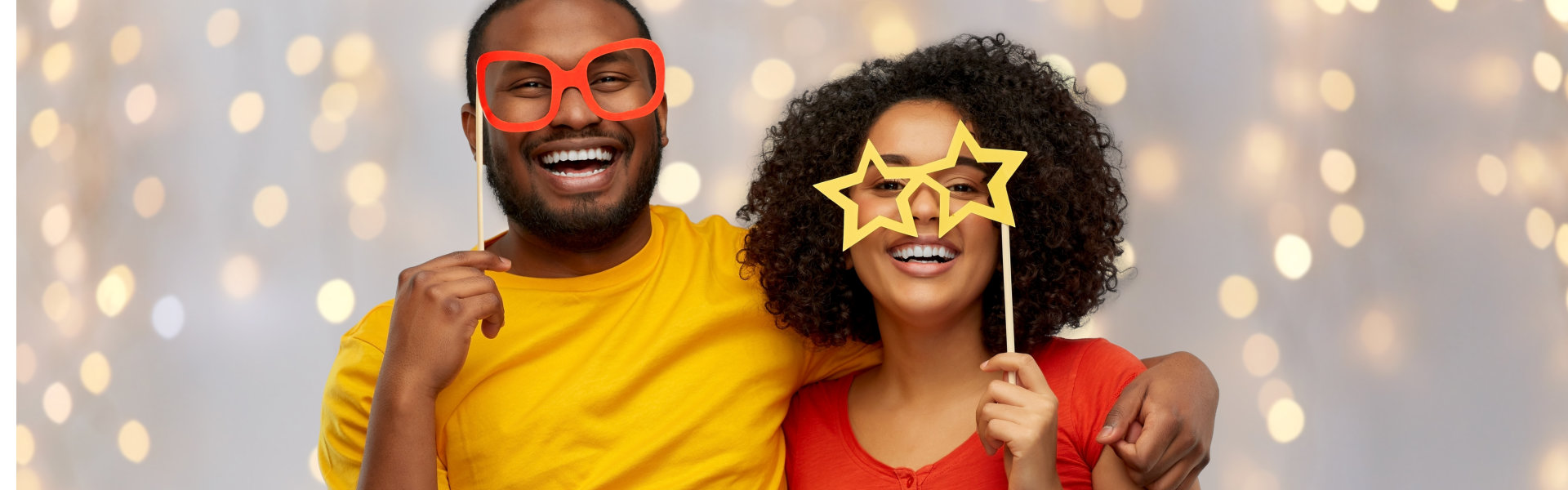 a man and a woman smiling at the party